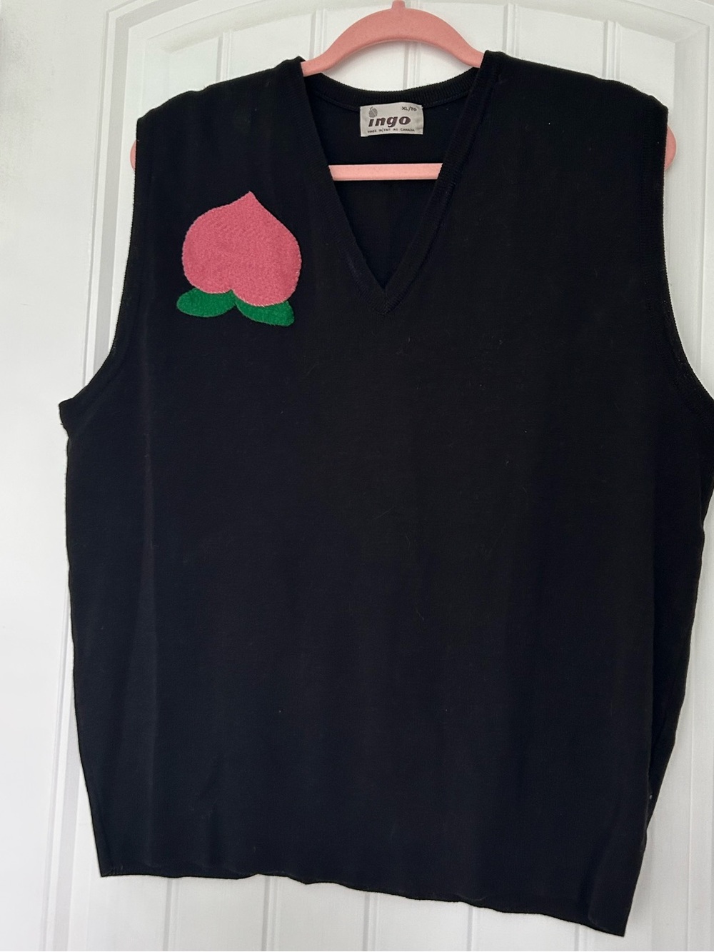 Peach sweater vest